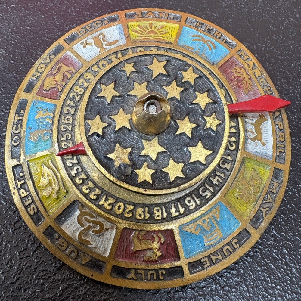 Vintage Brass Zodiac Calendar Disc with Red Pointers